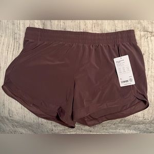 NWT Athleta mesh racer run 4” shorts size large